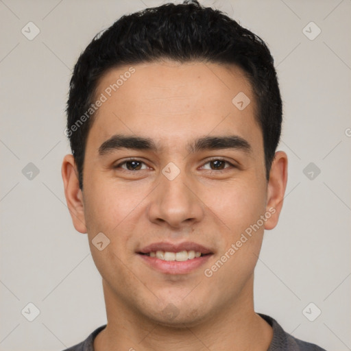 Joyful white young-adult male with short  black hair and brown eyes