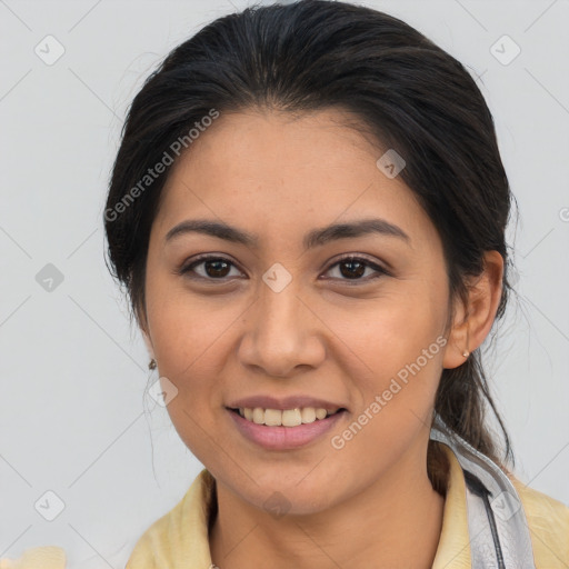 Joyful latino young-adult female with medium  brown hair and brown eyes