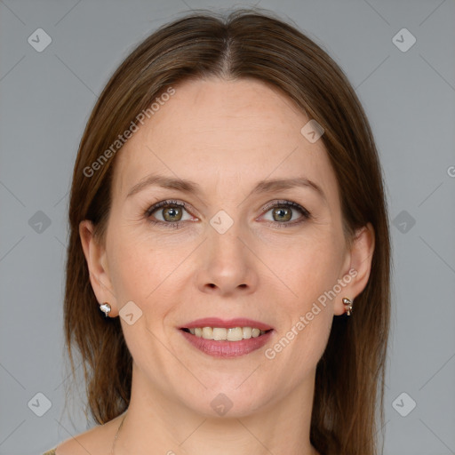 Joyful white adult female with medium  brown hair and grey eyes