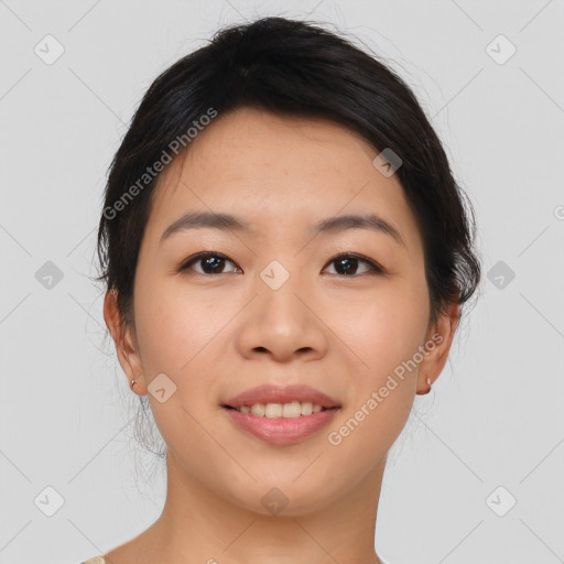 Joyful asian young-adult female with short  brown hair and brown eyes