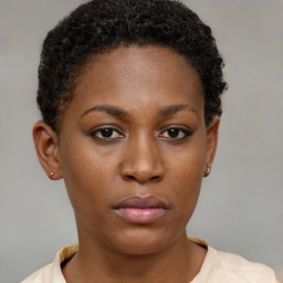 Neutral black young-adult female with short  brown hair and brown eyes