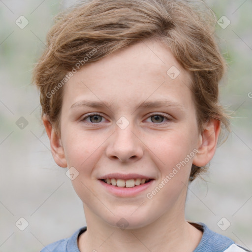 Joyful white child female with short  brown hair and grey eyes