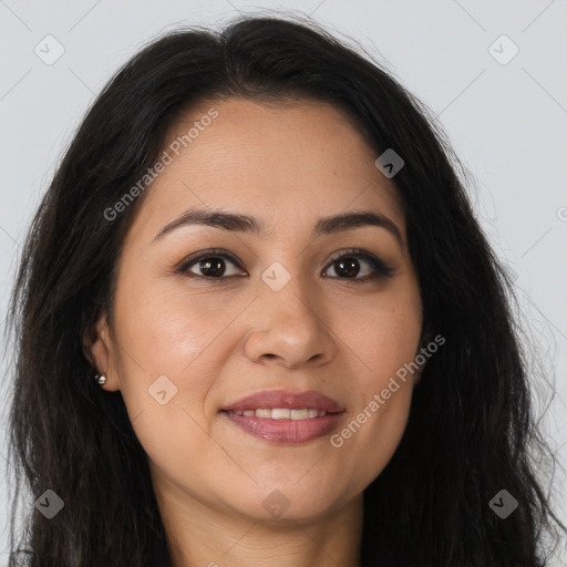 Joyful latino young-adult female with long  brown hair and brown eyes