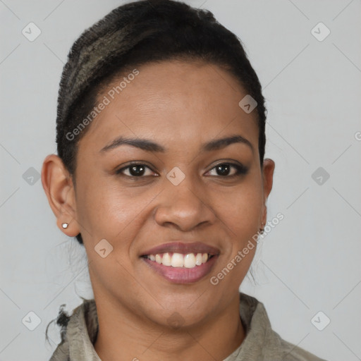 Joyful black young-adult female with short  brown hair and brown eyes