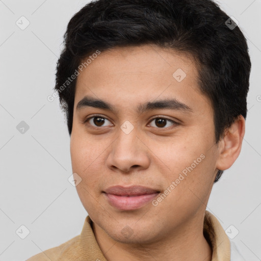 Joyful latino young-adult male with short  brown hair and brown eyes