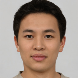 Neutral asian young-adult male with short  brown hair and brown eyes