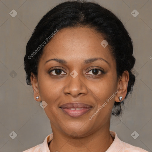 Joyful black adult female with medium  brown hair and brown eyes