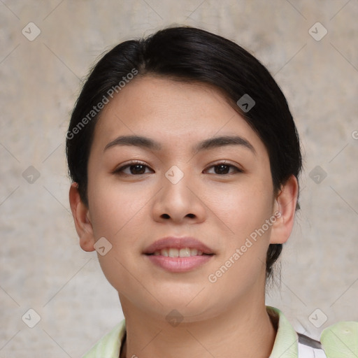 Joyful asian young-adult female with short  black hair and brown eyes