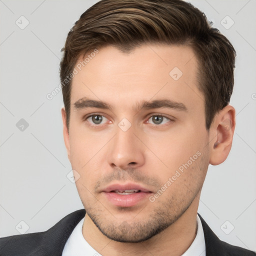 Neutral white young-adult male with short  brown hair and brown eyes