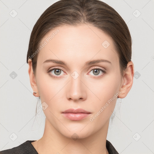 Neutral white young-adult female with medium  brown hair and grey eyes