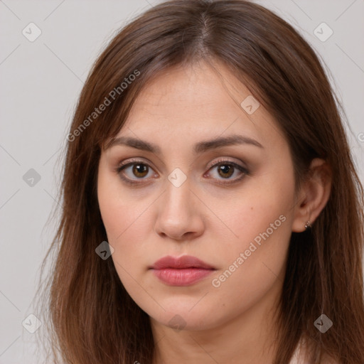 Neutral white young-adult female with long  brown hair and brown eyes