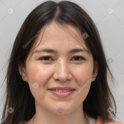 Joyful white adult female with medium  brown hair and brown eyes