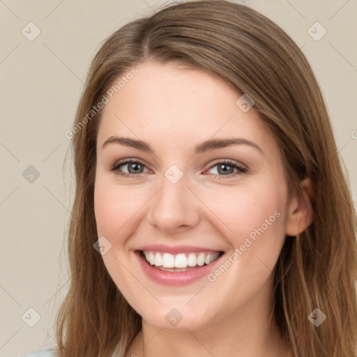 Joyful white young-adult female with long  brown hair and green eyes