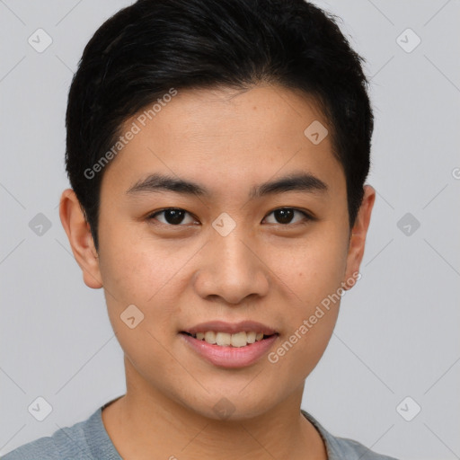 Joyful asian young-adult male with short  brown hair and brown eyes