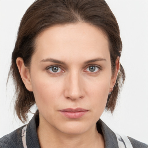 Neutral white young-adult female with medium  brown hair and grey eyes