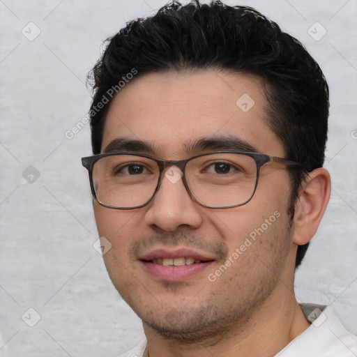 Joyful white young-adult male with short  black hair and brown eyes