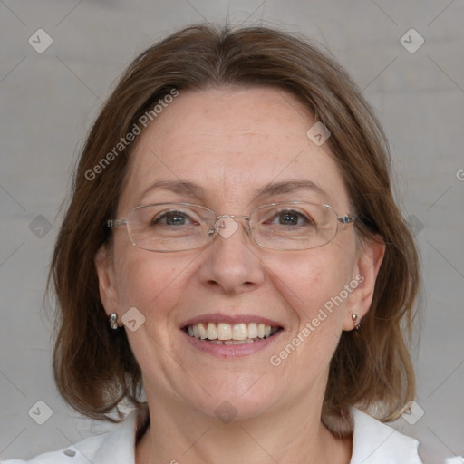 Joyful white adult female with medium  brown hair and blue eyes