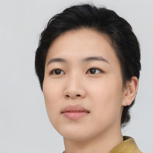 Neutral asian young-adult female with medium  black hair and brown eyes