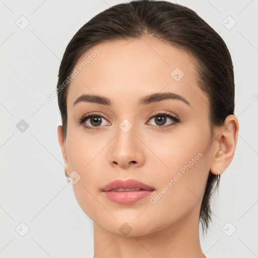 Neutral white young-adult female with medium  brown hair and brown eyes