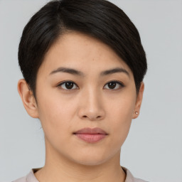 Neutral asian young-adult female with short  brown hair and brown eyes