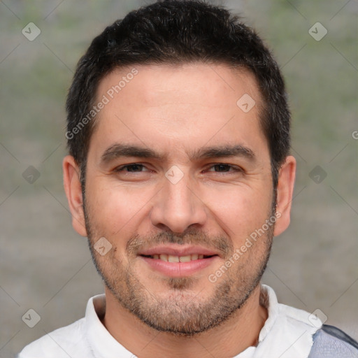 Joyful white adult male with short  brown hair and brown eyes