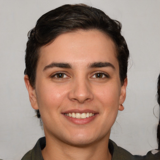 Joyful white young-adult male with medium  brown hair and brown eyes