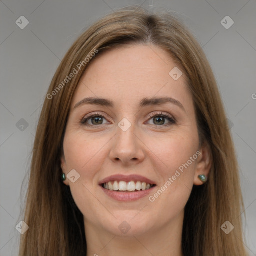 Joyful white young-adult female with long  brown hair and green eyes