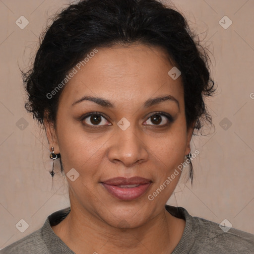 Joyful latino adult female with short  brown hair and brown eyes