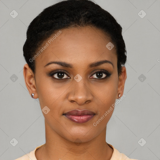 Joyful black young-adult female with short  black hair and brown eyes