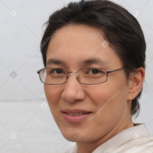 Joyful white adult female with short  brown hair and brown eyes