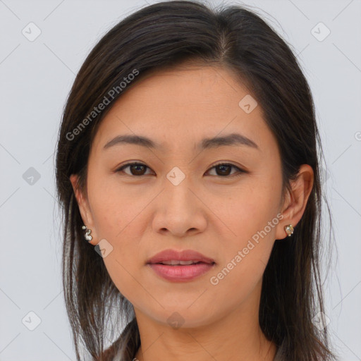 Joyful asian young-adult female with medium  brown hair and brown eyes