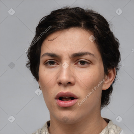 Neutral white young-adult female with medium  brown hair and brown eyes