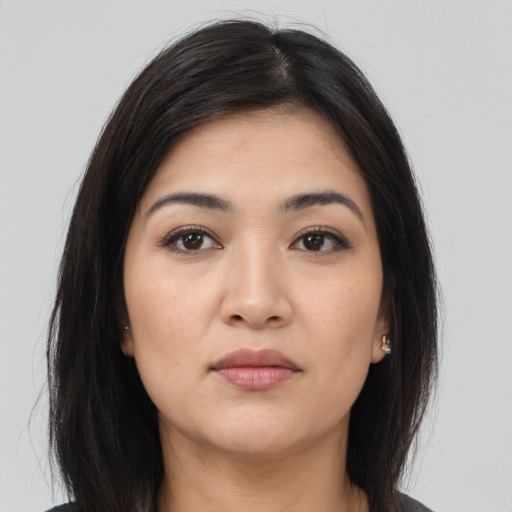 Neutral asian young-adult female with long  brown hair and brown eyes