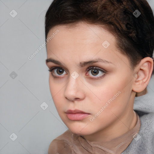 Neutral white young-adult female with short  brown hair and brown eyes