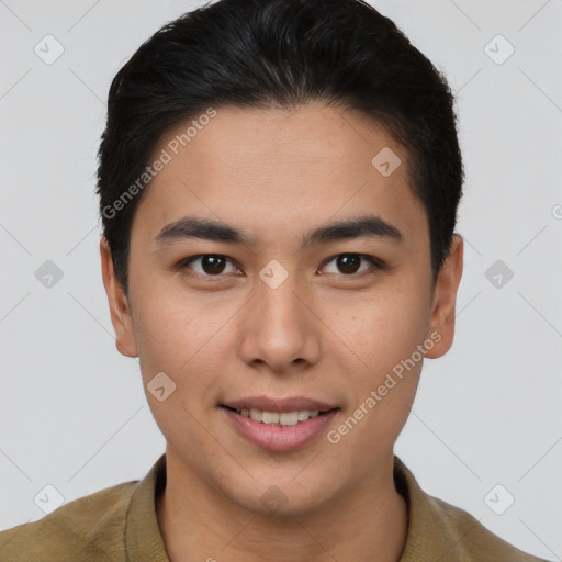 Joyful asian young-adult male with short  brown hair and brown eyes