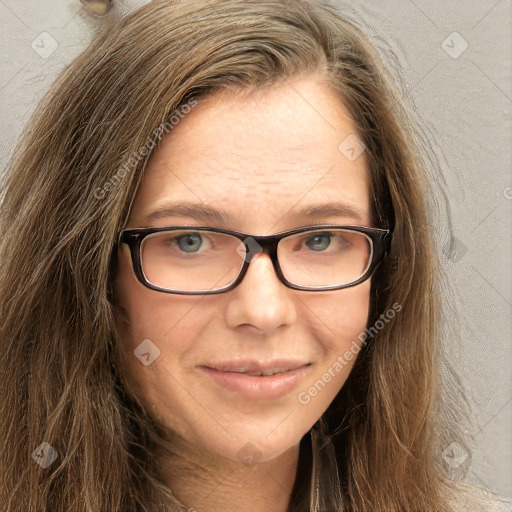 Joyful white young-adult female with long  brown hair and green eyes