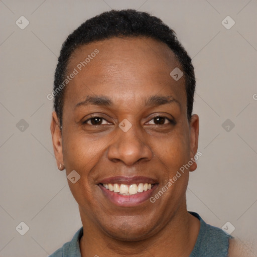 Joyful latino adult male with short  black hair and brown eyes
