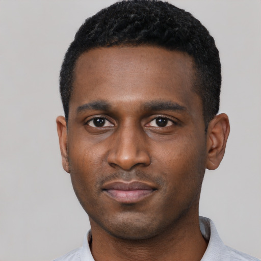 Neutral black young-adult male with short  black hair and brown eyes