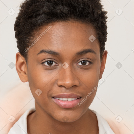 Joyful black young-adult female with short  brown hair and brown eyes