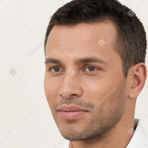 Neutral white young-adult male with short  brown hair and brown eyes