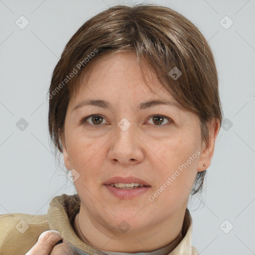 Joyful white adult female with medium  brown hair and brown eyes