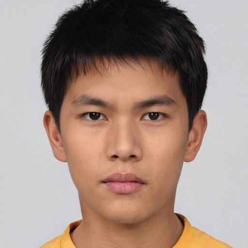Neutral asian young-adult male with short  brown hair and brown eyes