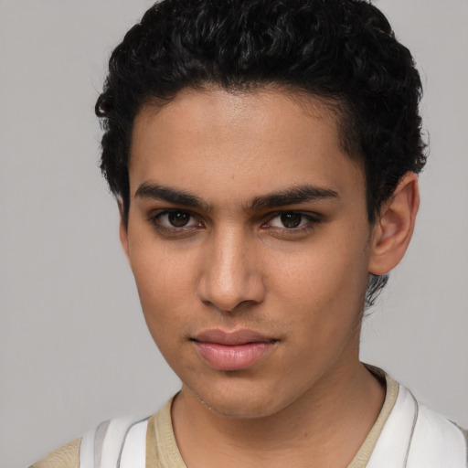 Neutral latino young-adult male with short  black hair and brown eyes