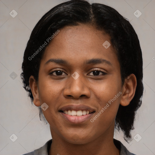 Joyful black young-adult female with medium  black hair and brown eyes