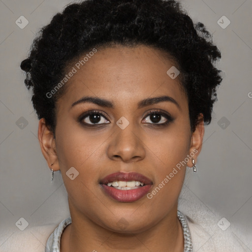 Joyful black young-adult female with short  brown hair and brown eyes