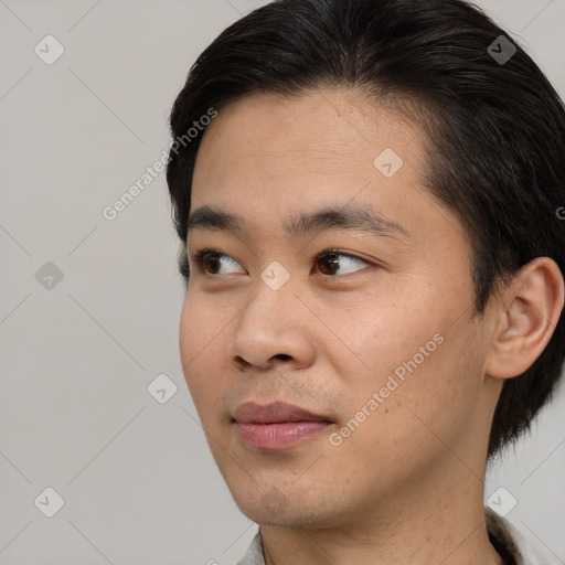 Neutral asian young-adult male with short  black hair and brown eyes