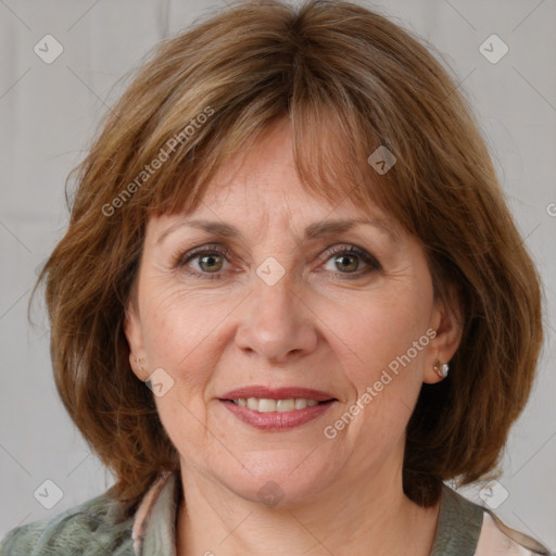 Joyful white adult female with medium  brown hair and grey eyes