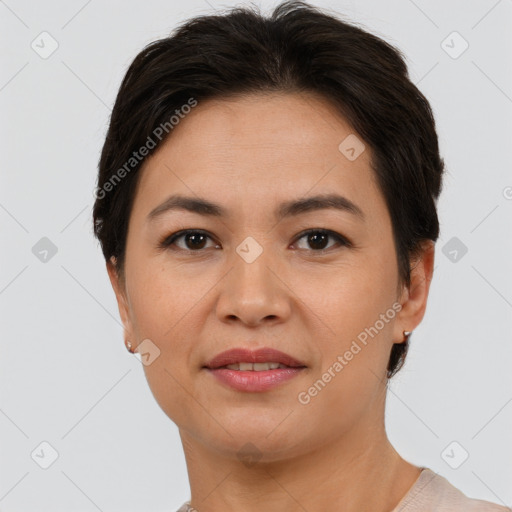 Joyful asian young-adult female with short  brown hair and brown eyes