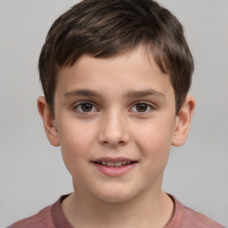 Joyful white child male with short  brown hair and brown eyes