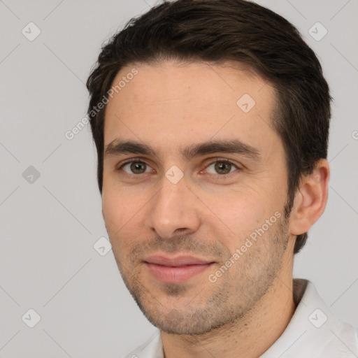 Joyful white young-adult male with short  brown hair and brown eyes